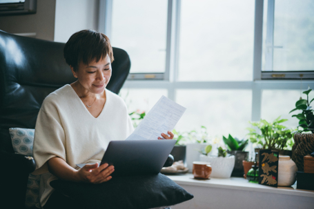 older woman reviewing documents