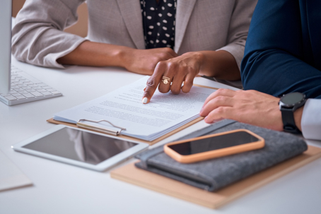 people reviewing documents in an office
